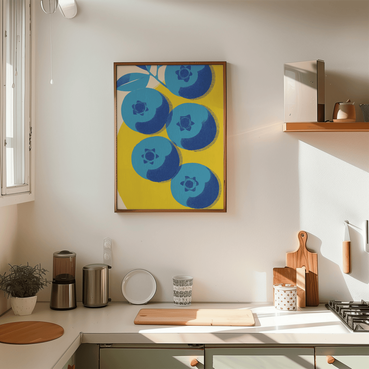 Blueberry wall art with blue and yellow minimalist illustration hanging in a kitchen above wooden chopping boards