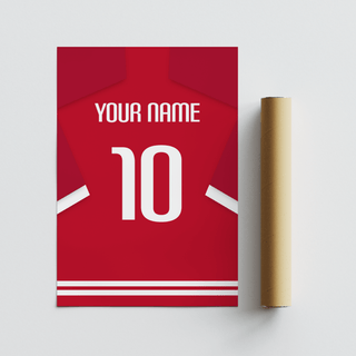 Football Shirt Poster in Red with Bold White 10 with rolled packaging tube on a grey surface