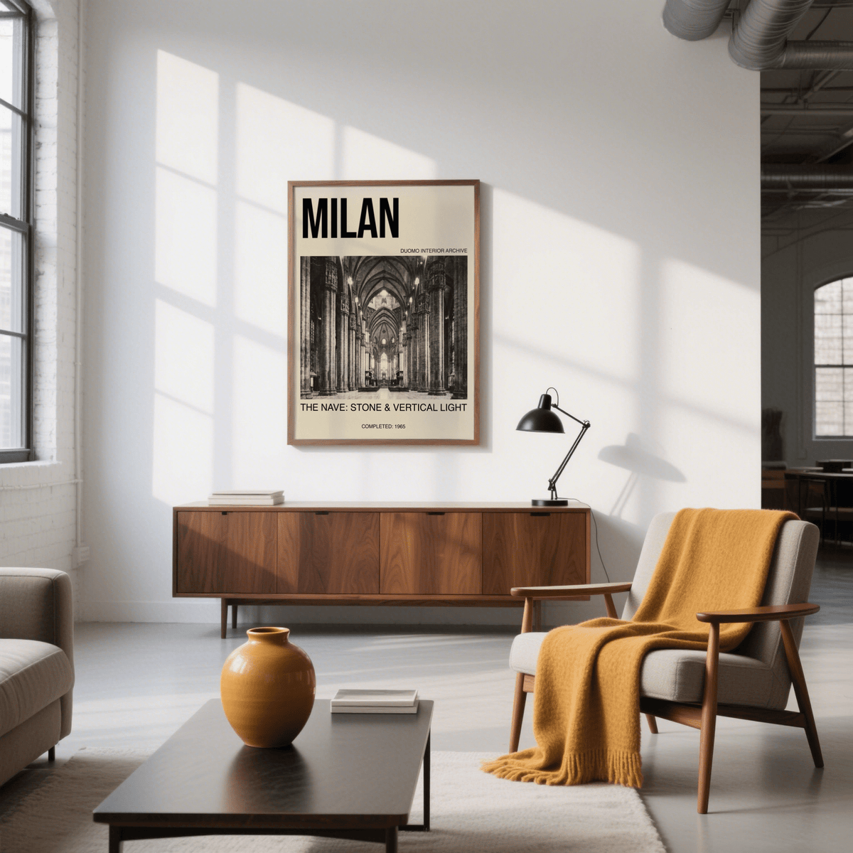 Milan Architecture Art Print hanging above wooden cabinet with lamp in bright living room