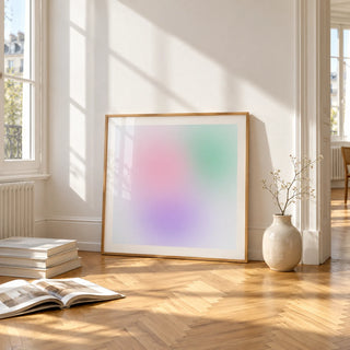 Danish Pastel Print, framed and leaning on the parquet floor of a bright living room