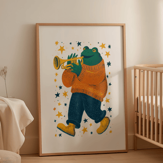 Print leaning on the floor showing frog playing trumpet art with orange, green and blue tones in a nursery