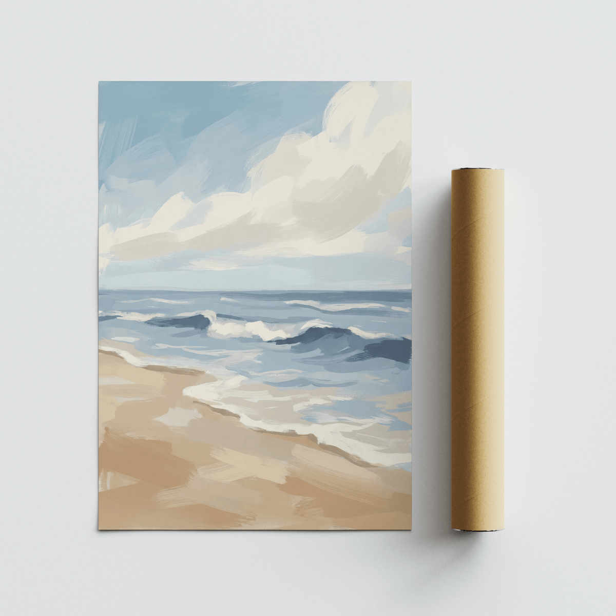 Seascape Poster laid flat with a brown packaging tube showing sandy beach and blue watercolour waves