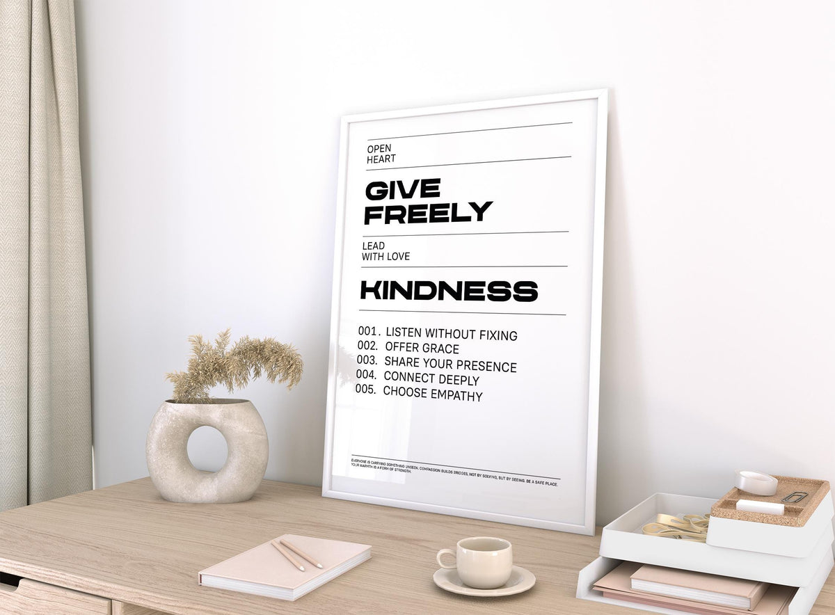 Art with Quotes leaning on a desk with neutral colours and a round vase in a bright room