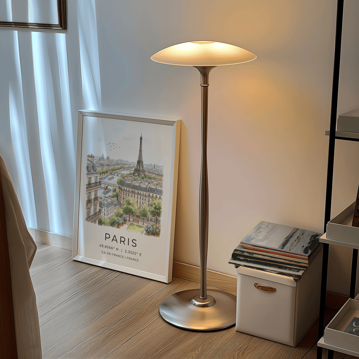 Paris Cityscape art print leaning on a floor by a lit lamp and a white storage box