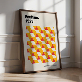Art Posters Gallery print leaning on floor showing geometric triangles pattern in yellow and red