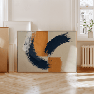 Print leaning on a floor with blue and orange brush strokes minimal abstract art near a window with a radiator