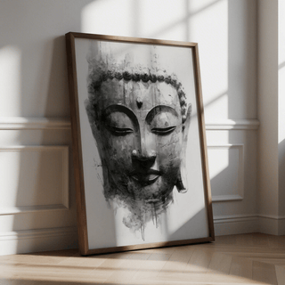 Print leaning on floor of Buddha face in black and grey watercolour style with wooden frame