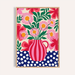 Framed Colorful Flower Art Print with pink daisies and green leaves in a red striped vase