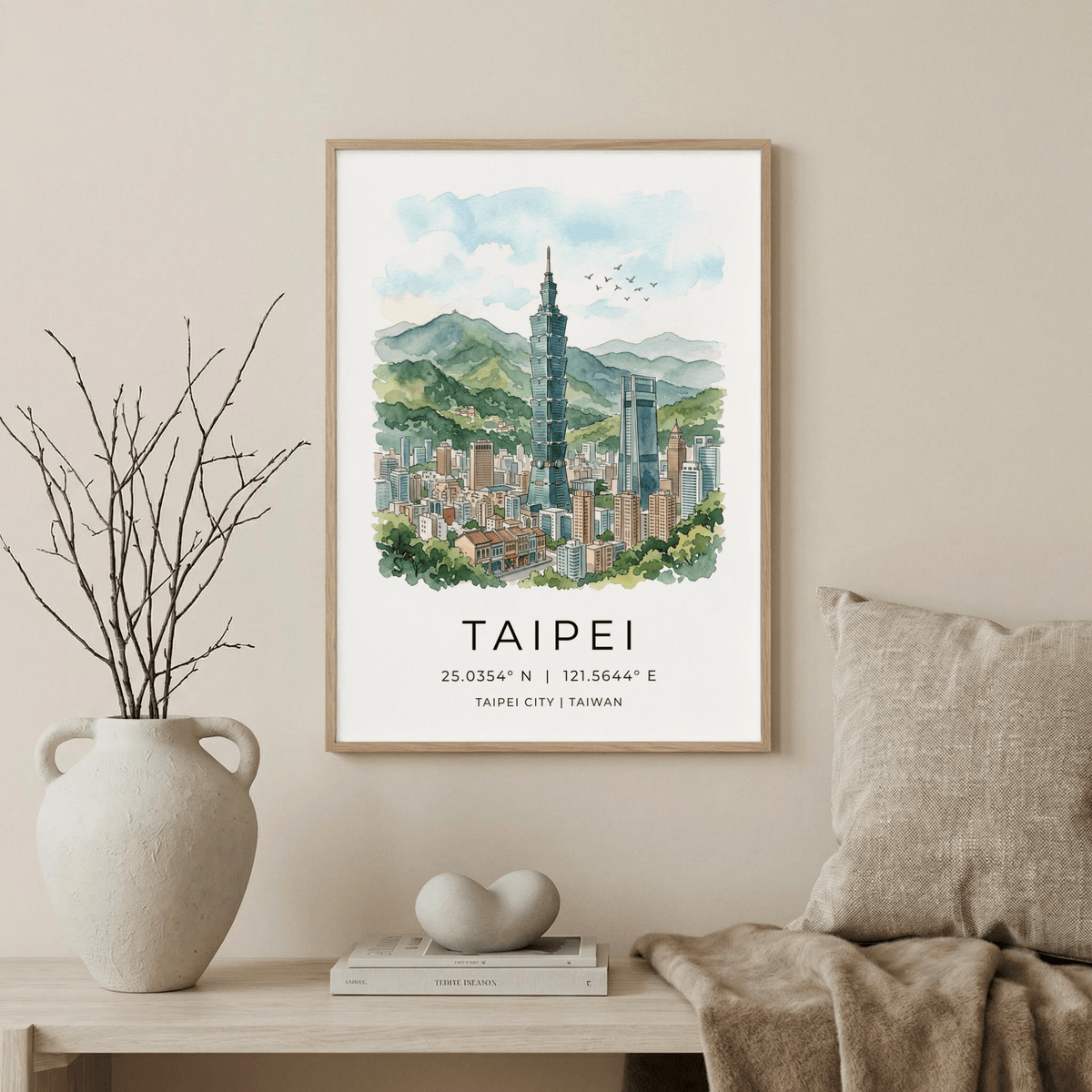 Print of Taipei City Art with Taipei 101 skyscraper in watercolour hanging above a shelf with pottery and books