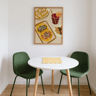 Mexican Food Art Print on a wall above a white round table with green chairs