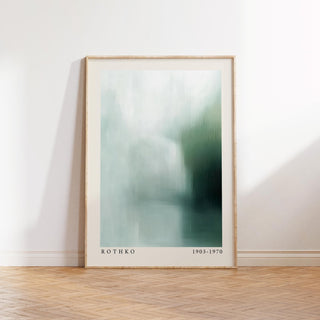 Print leaning on a wooden floor wall art abstract in blue and green soft tones