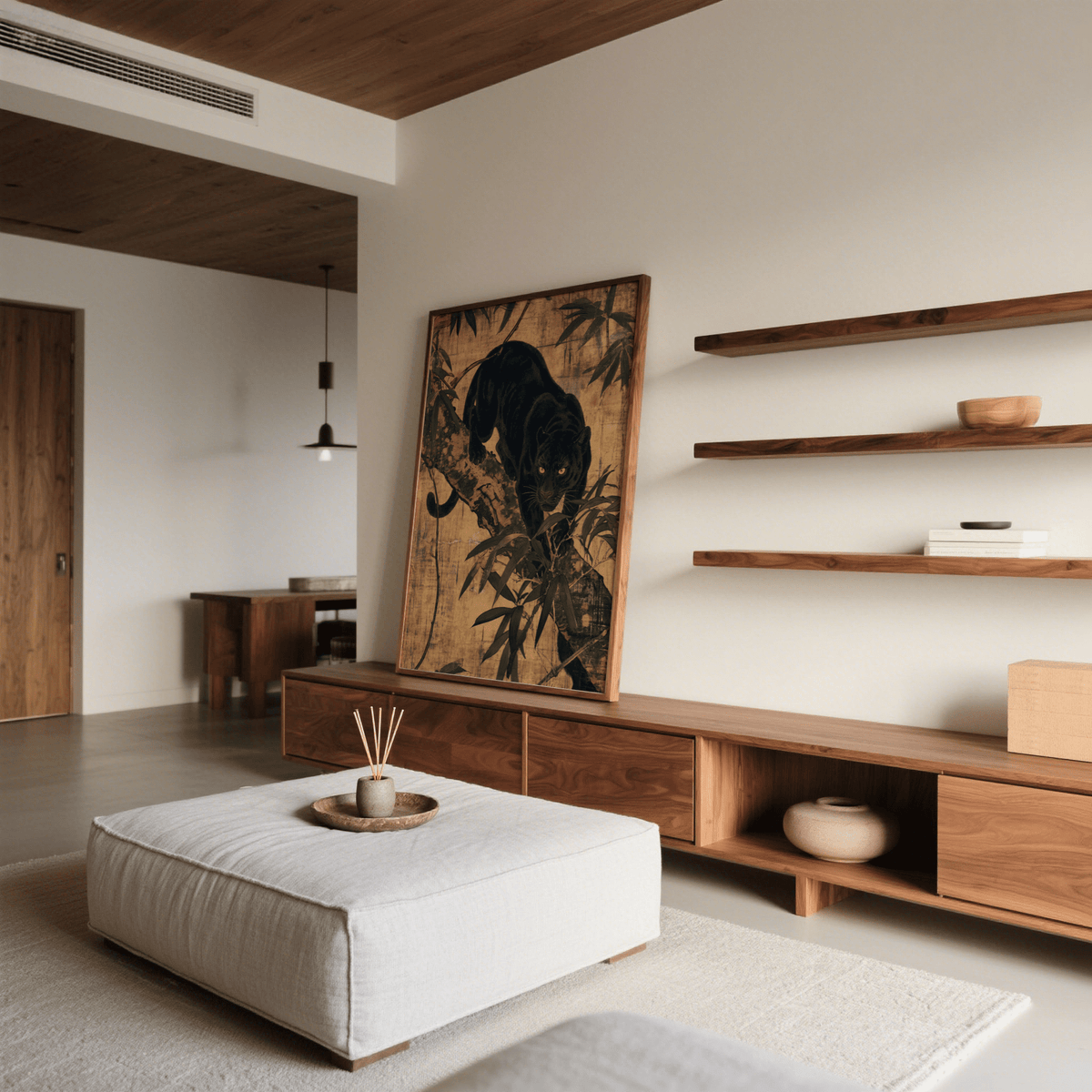 Jungle wall art of a black panther in japanese ink style leaning on a wooden sideboard in a living room