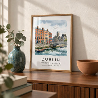 Dublin City Art Print, a small A4 framed print leaning on a walnut sideboard in a living room