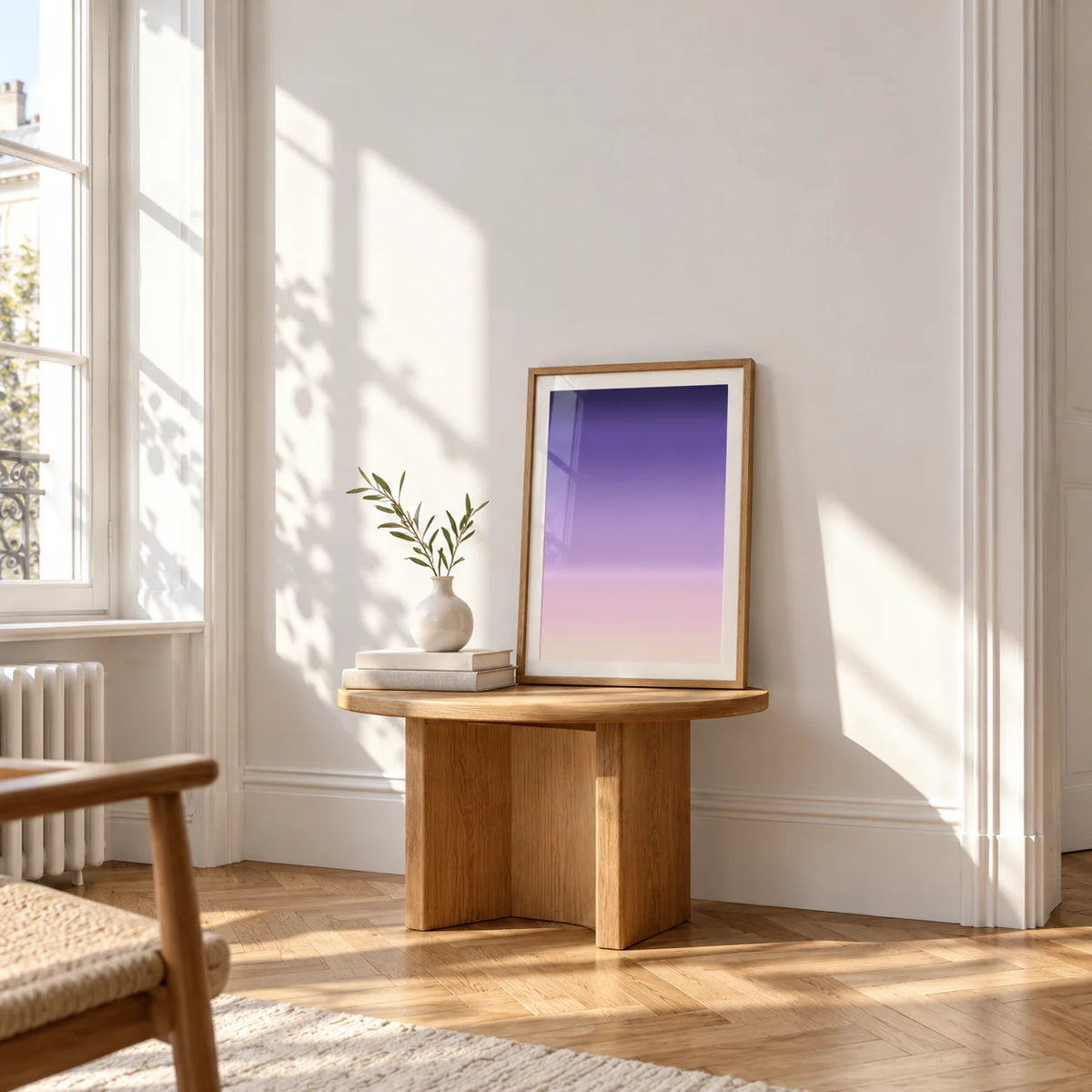 Dusk Wall Art, a small A4 framed print leaning on a small solid oak side table