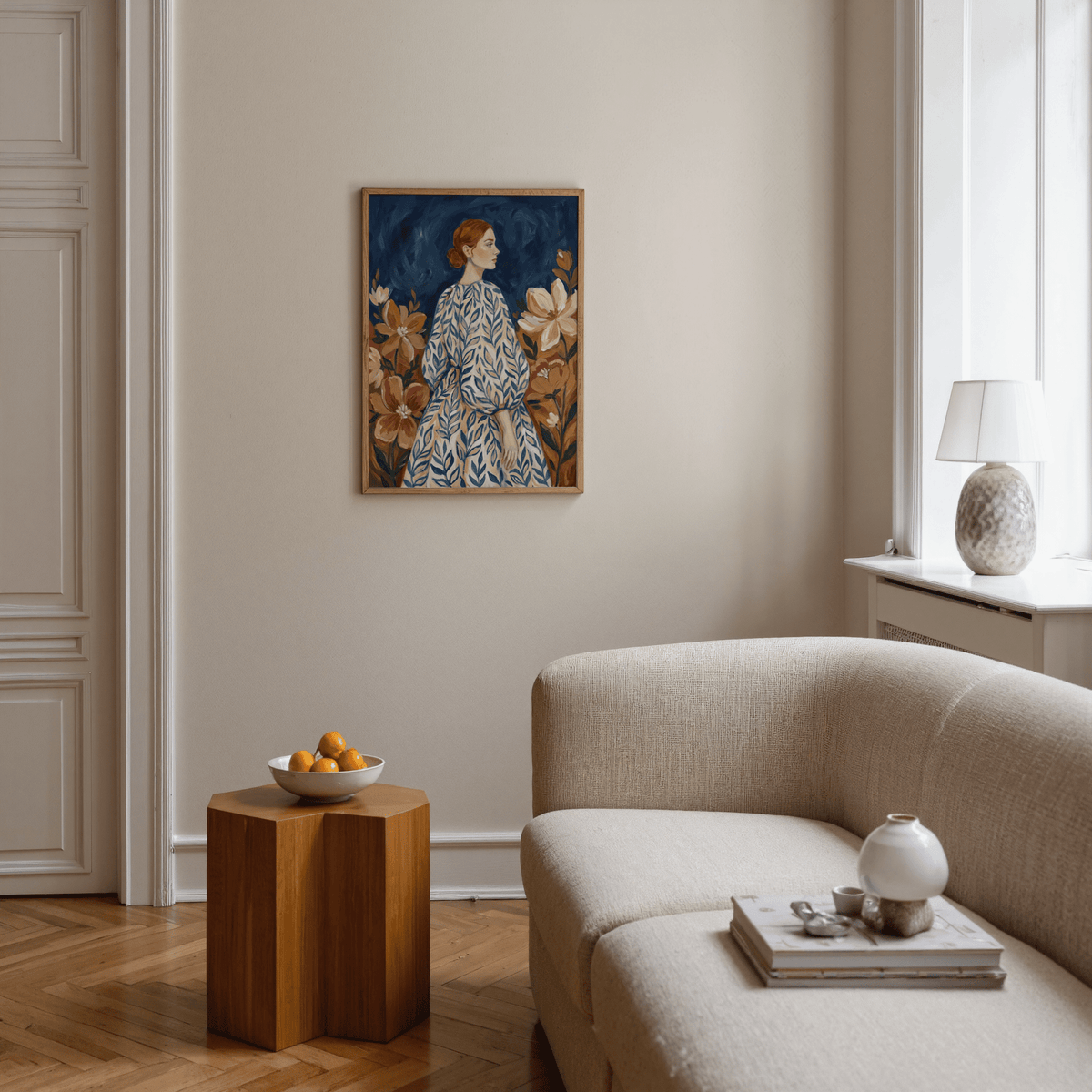 Floral Portrait Art hanging on a beige wall with a wooden side table and cream sofa in the room