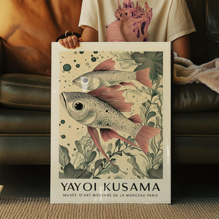 Person holding Large Fish Wall Art featuring two pink finned fish and botanical illustration in neutral tones
