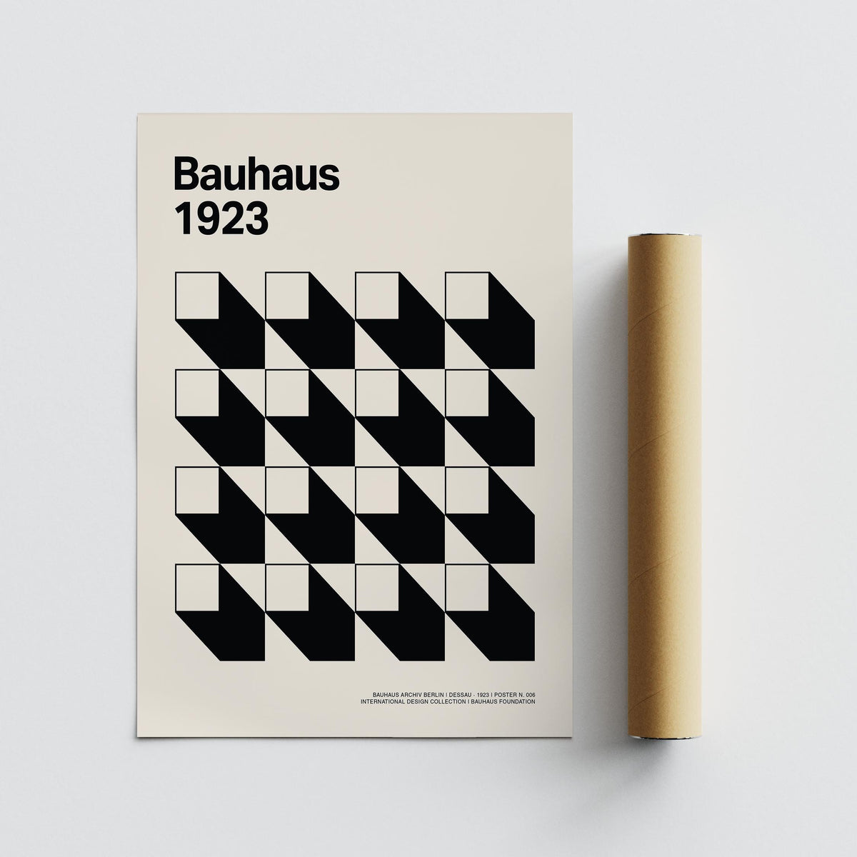 Close-up of Office Space Poster showing black and white geometric shapes with a packaging tube next to it