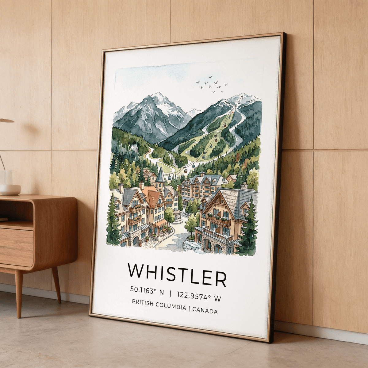 Whistler Mountain Print leaning framed in a wooden woodgrained room on the floor with muted colours