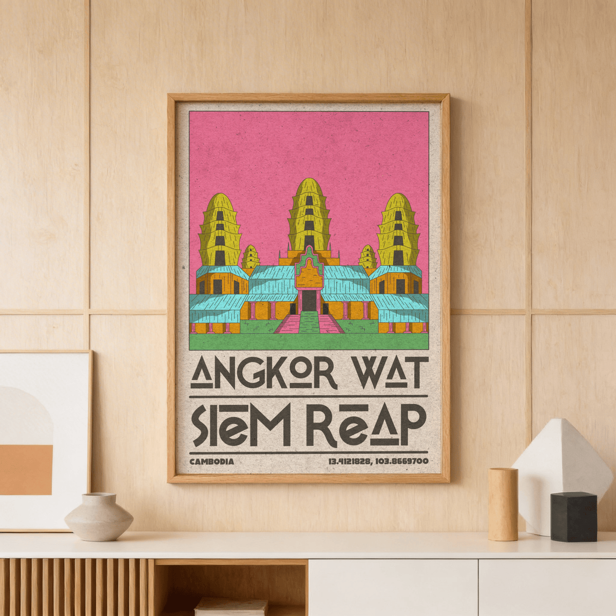 Framed Angkor Wat Art illustration with retro colours on a wooden wall with shelf and pottery
