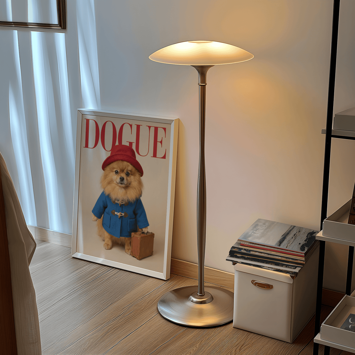 Pomeranian Poster print leaning by floor lamp with stack of books on a white basket