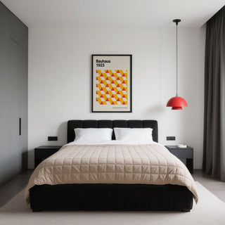 Art Posters Gallery framed print with geometric triangles in yellow and red above a bed with white pillows