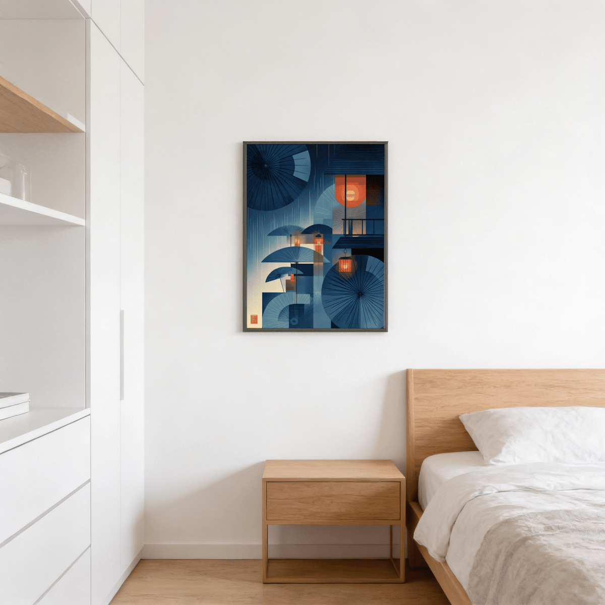 Japanese Umbrella wall art in blue and orange tones hanging above a wooden bedside table in a bedroom