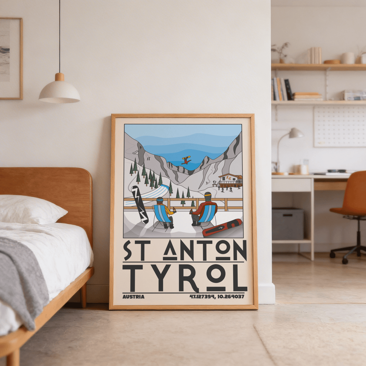 Print leaning on the floor of a bedroom showing St Anton Tyrol ski resort scene with blue sky and mountain illustration