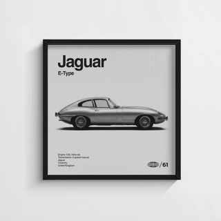White and grey tones showcase classic British roadster in modern workspace décor