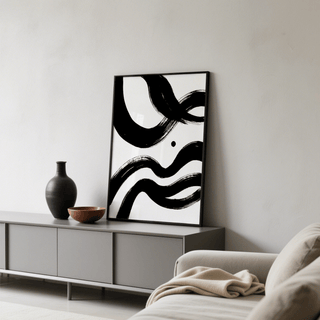 Black and white paintings abstract leaning print of black ink waves on a sideboard with a vase
