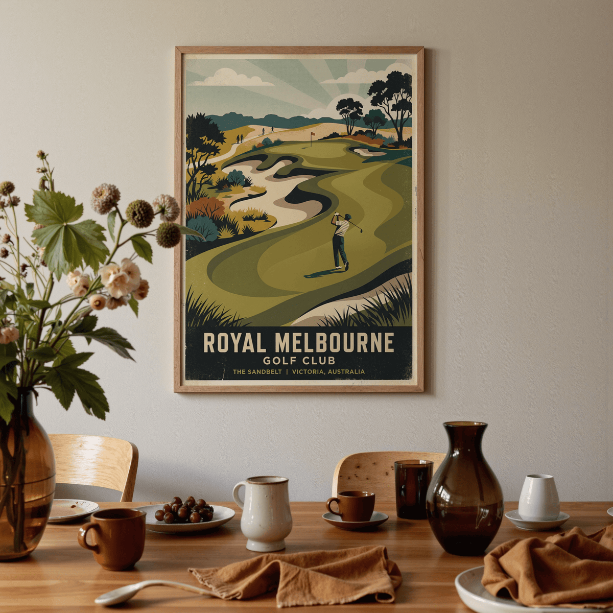 Royal Melbourne Golf Art print of a golfer swinging on a green course with sandy patches in a dining area with a wooden table and various