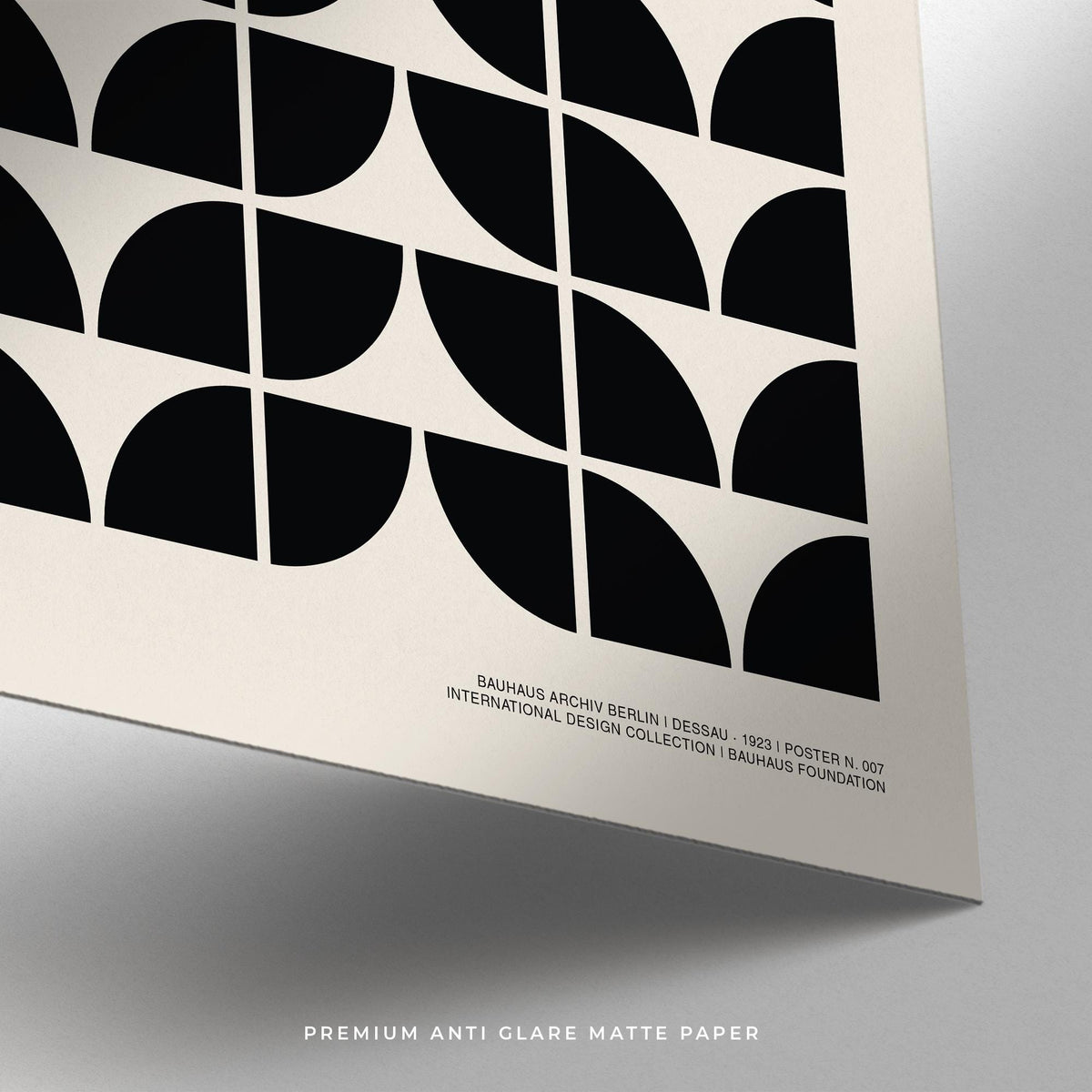 Close-up of Mid Century Art Prints showing a black bauhaus geometric pattern on matte paper