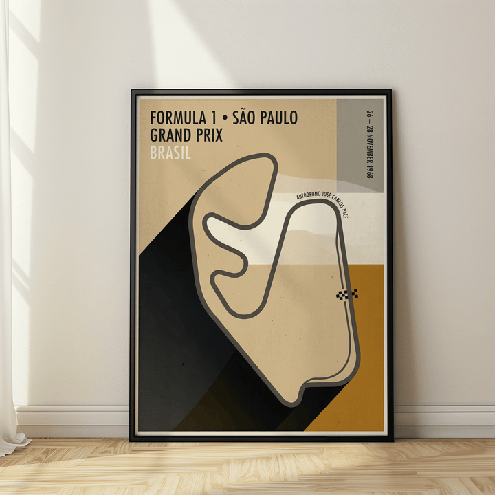 Framed Sao Paulo Race Circuit Diagram Poster leaning on a wooden floor near a wall with shadow
