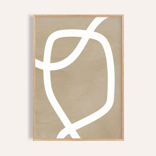 Framed close-up of minimalist art wall featuring curved white line on beige background