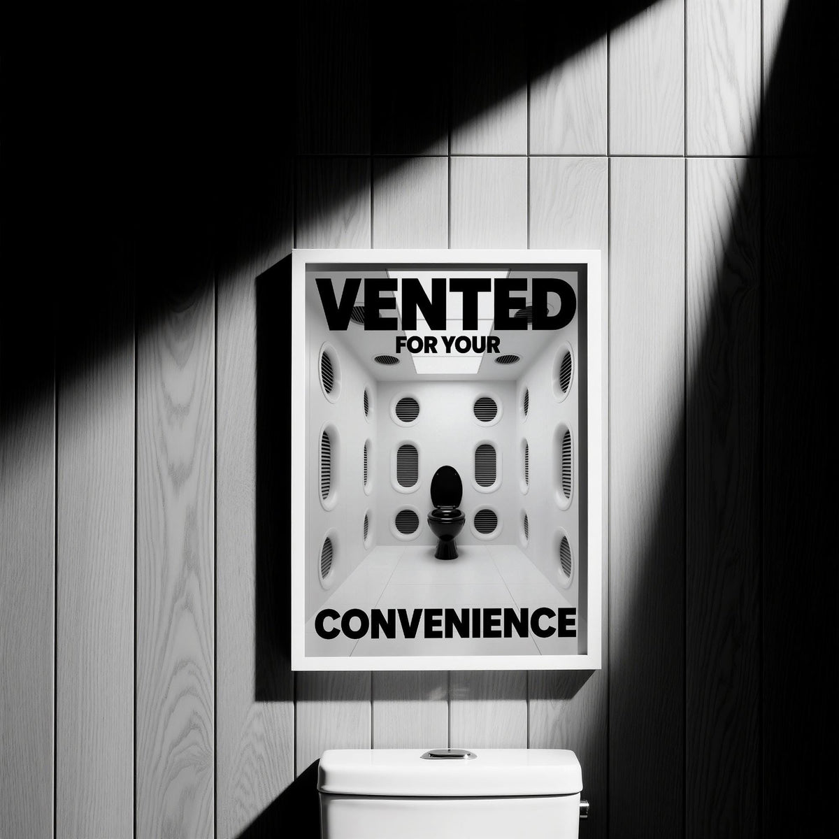 Framed Funny Toilet Sign print showing a black toilet in a vented white room on a wood wall above a white cistern