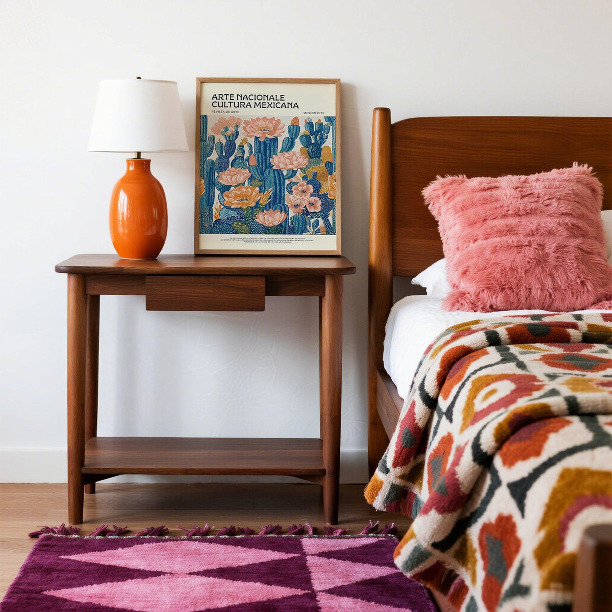 Flat-lay photo of rolled tube and Mexican Boho Decor cactus poster.