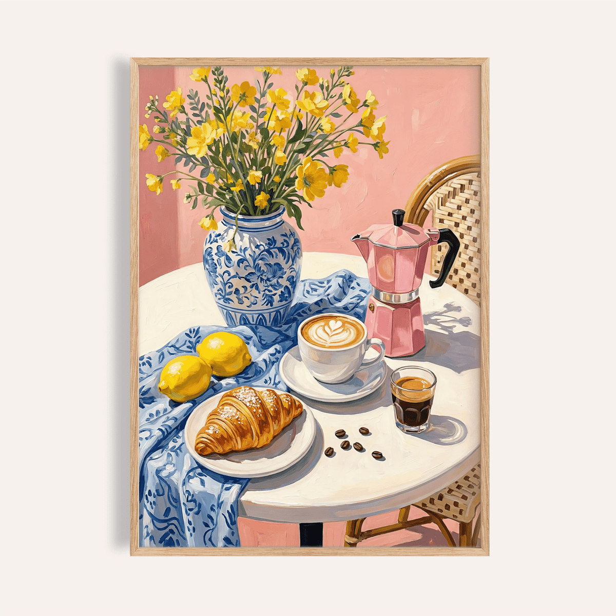 Framed Floral Kitchen Decor print showing yellow flowers in a blue vase on a table with coffee and pastry