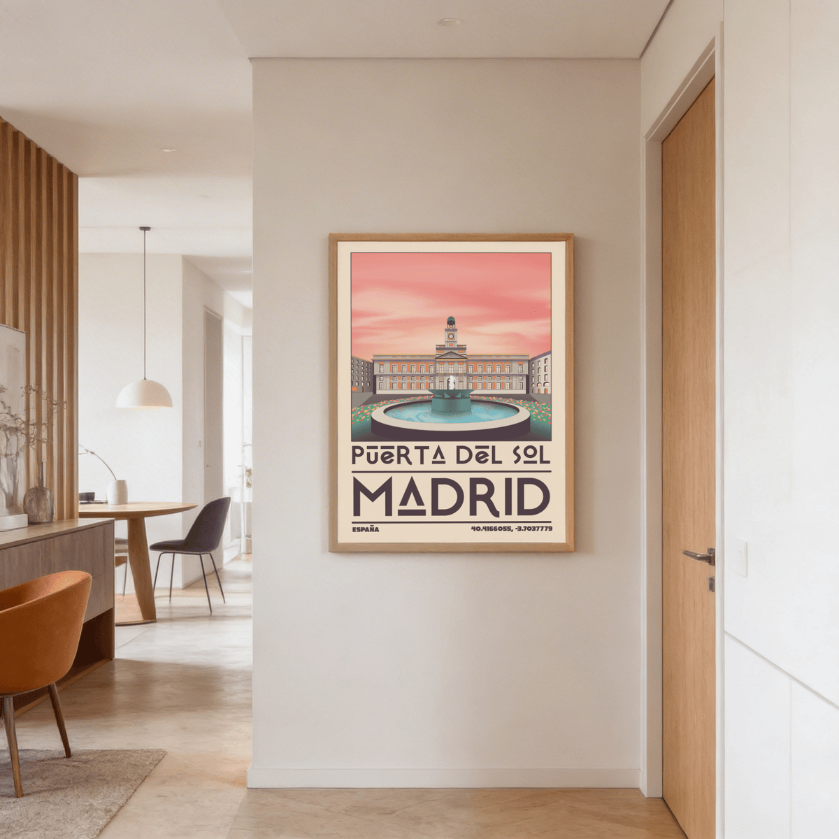 Madrid Landmark Art Print framed on a beige wall with a dining area visible to the left