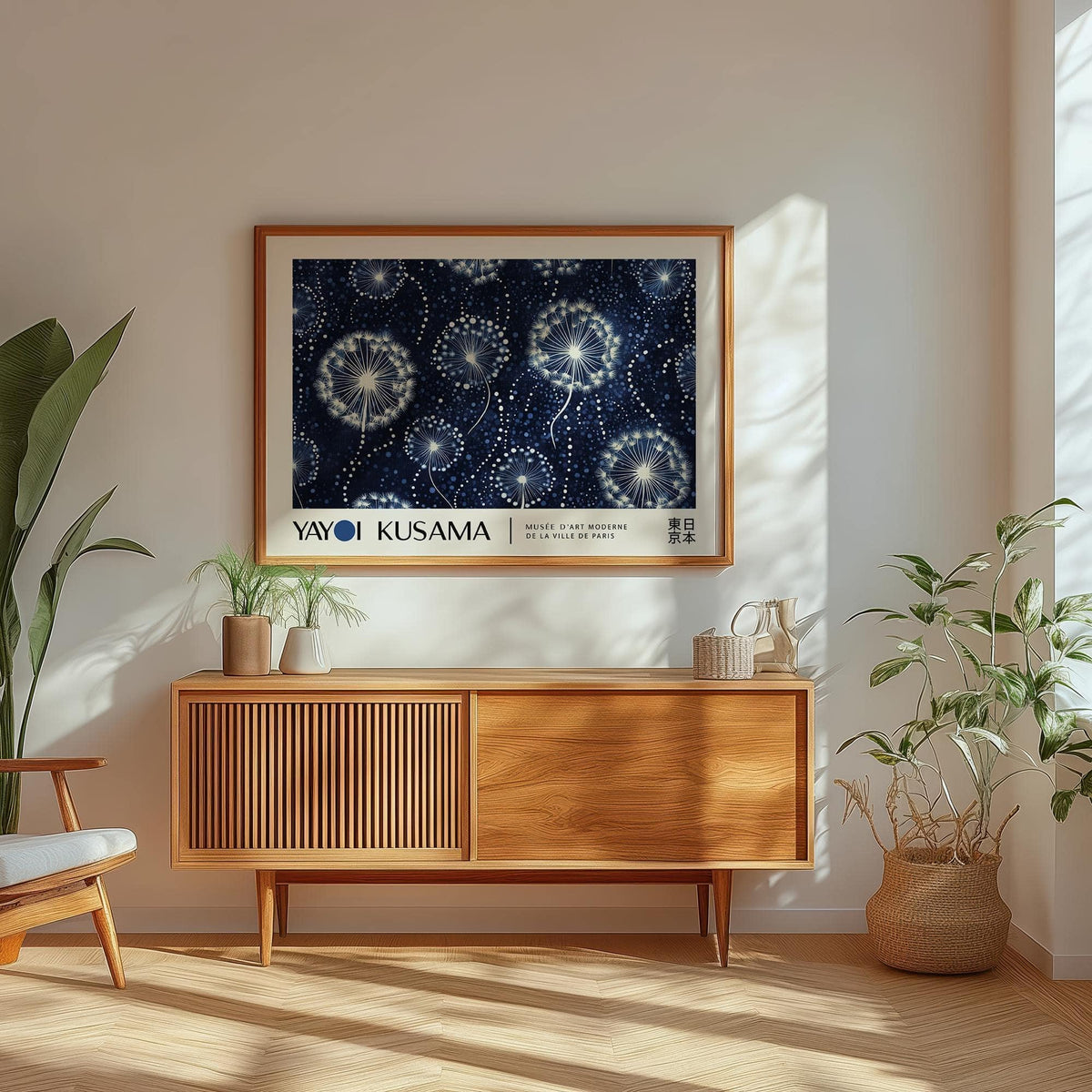Landscape posters of dandelion seed heads illustration in blue and white above a wooden sideboard