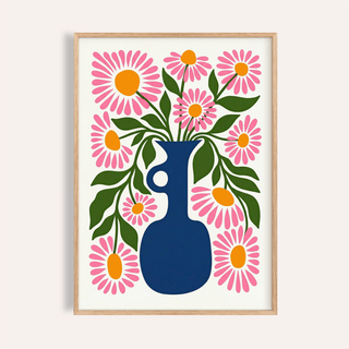 Framed flower vase print with pink daisies in a blue vase and green leaves
