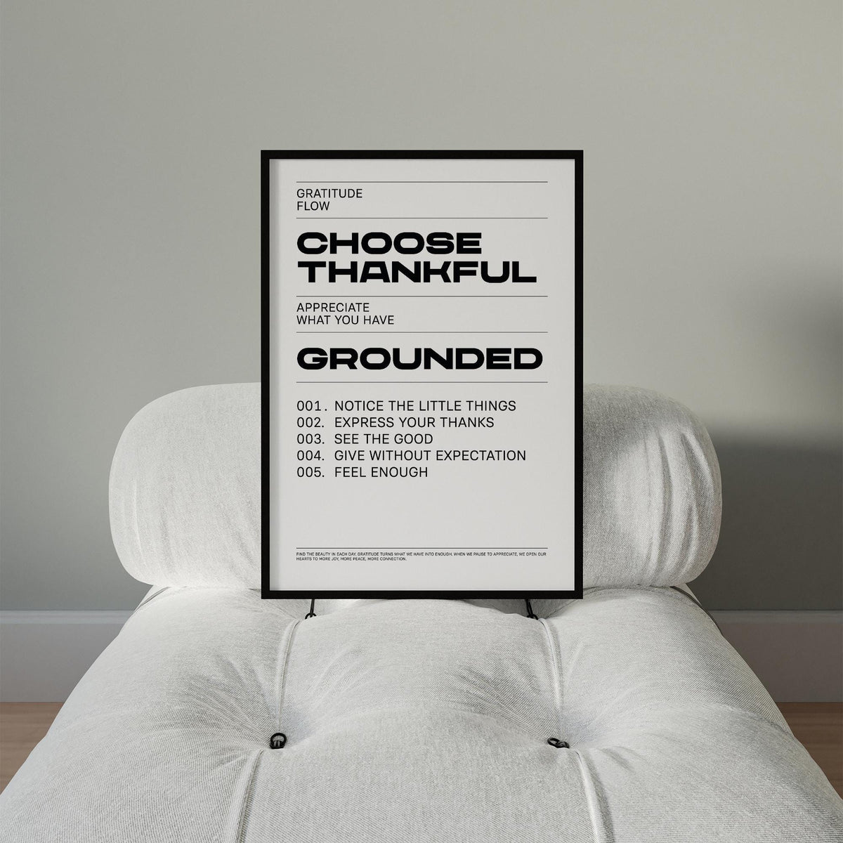Framed print with Choose Thankful text in black and white on a grey wall