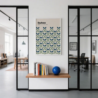 Blue and Green Wall Art with geometric leaf pattern above a shelf with books and a blue globe in office space
