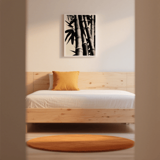 Print on a wall in a bedroom showing bamboo black and white print with minimalist photographic style above a wooden bed