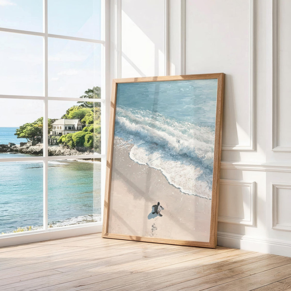 Turtle print leaning against a white wall with wood floor and large window nearby
