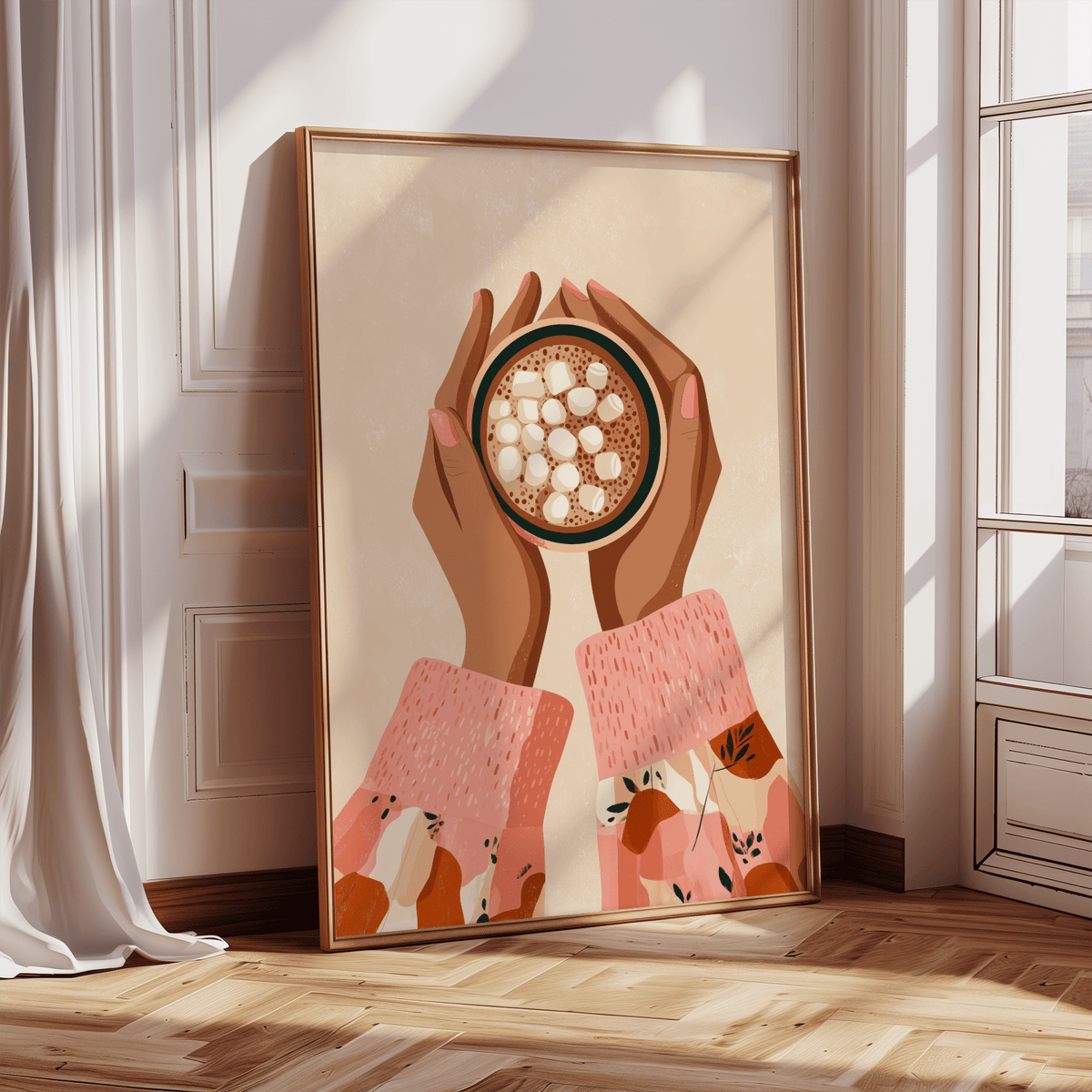 Print leaning on a wooden floor of hands holding hot cocoa with pink and brown sleeves near a sunlit window