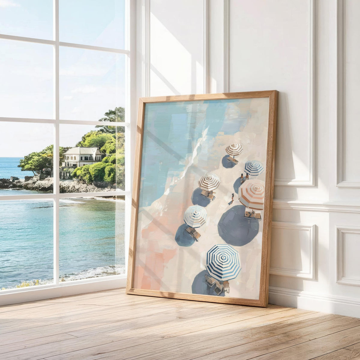 Beach Umbrella Print leaning on a floor by a bright window showing pastel striped umbrellas in blue and beige