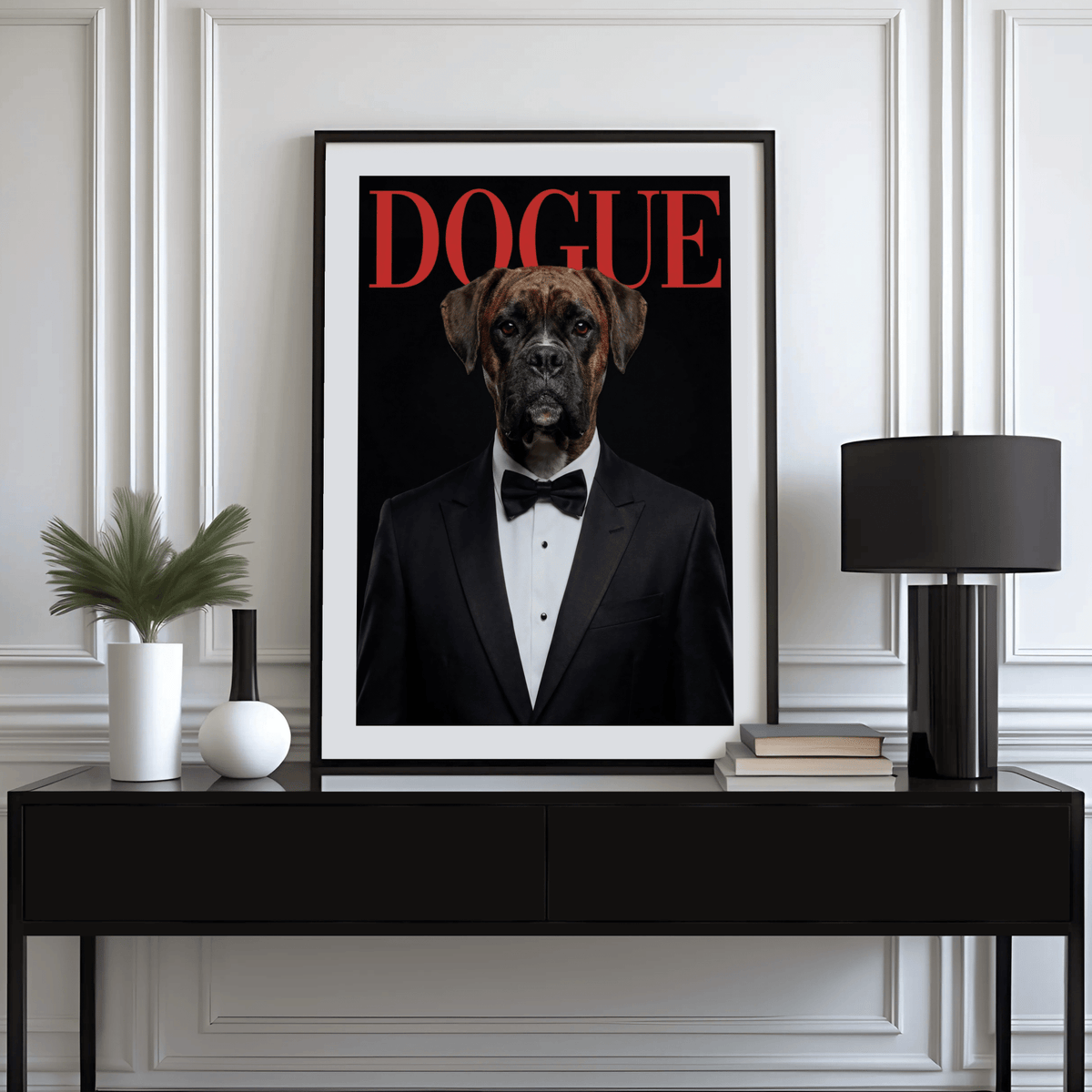 Print of Dogue Poster with boxer dog in tuxedo on a sideboard with a lamp and plant