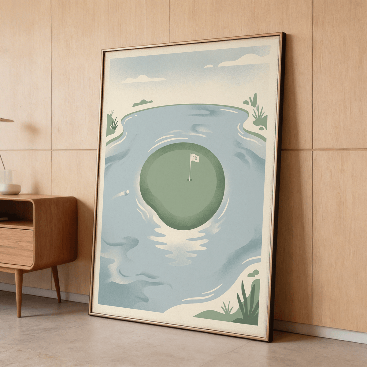 18th Hole wall art leaning against a wooden wall with a side table nearby