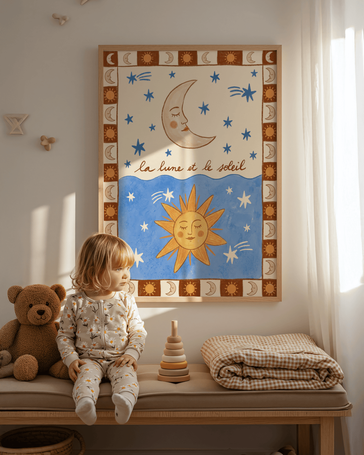 Print Moon And Sun Print framed featuring crescent moon and sun in folk-art style in a child's room with toys