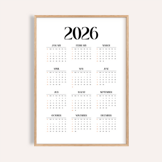 Minimalist wall calendar with black and orange text and numbers in a wood frame