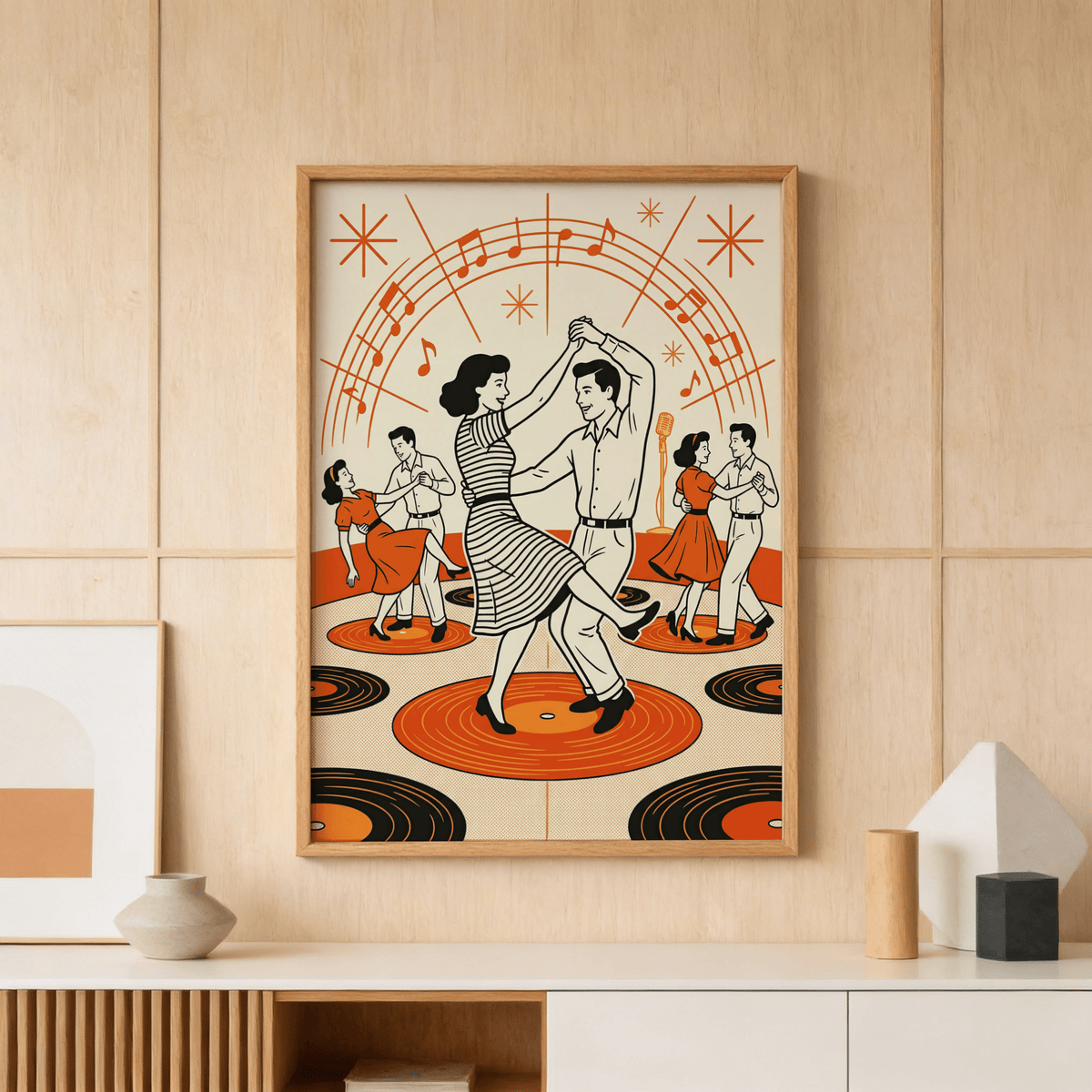 Retro Dance wall art of a dancing couple with orange and black records on a wood paneled wall above a sideboard